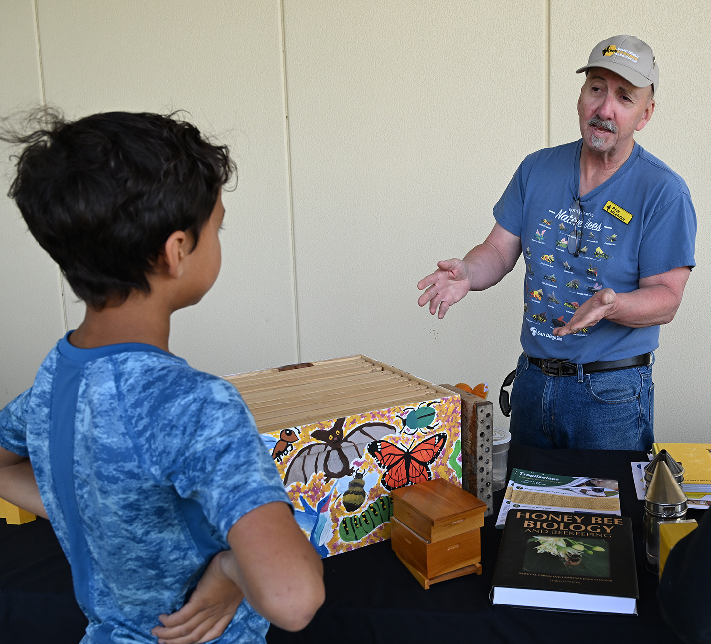 CAMBP member Rick Moehrke talks about the bees in the observation hive. (Photo by Kathy Keatley Garvey)