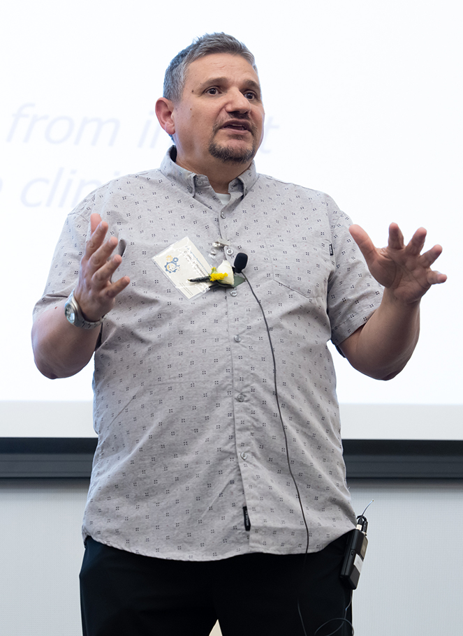 Researcher Christophe Morisseau delivering the joint presentation. (Photo by Thomas Ushing)