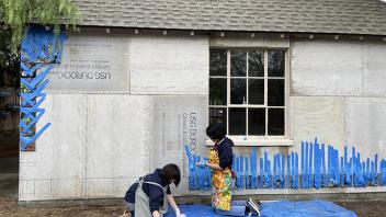 Preparing the site for the massive wall mural.