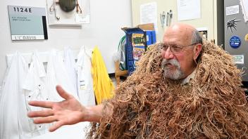Forensic entomologist Robert "Bob" Kimsey, a faculty retiree as of June 2024, wore his traditional ghilli suit. (Photo by Kathy Keatley Garvey)