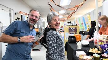 Bohart Museum director and arachnologist Jason Bond shares a laugh with retired Bohart Museum director Lynn Kimsey, dressed as a spider. (Photo by Kathy Keatley Garvey)