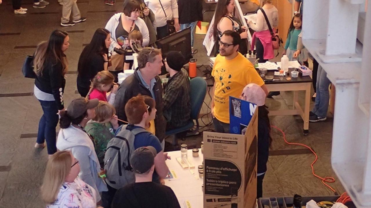 Christopher Pagan discussing nematodes at a recent UC Davis Biodiversity Museum Day. (Photo by Kathy Keatley Garvey)
