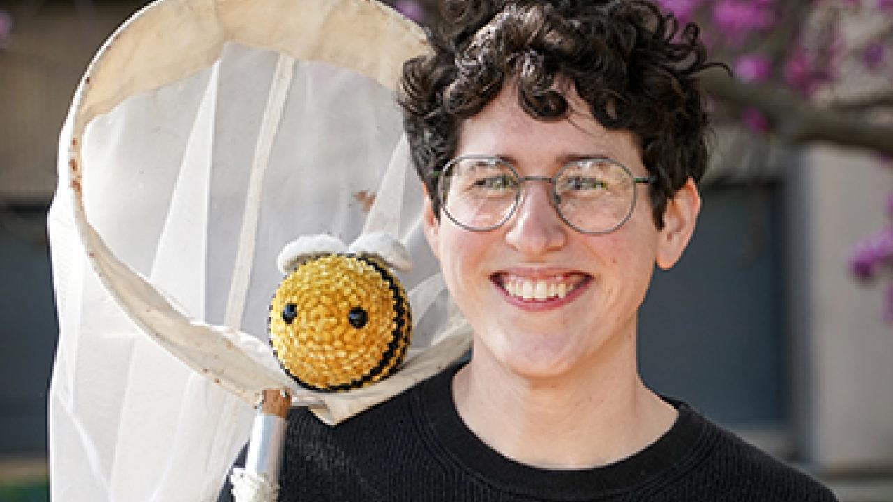 Microbial ecologist Danielle Rutkowski with insect net