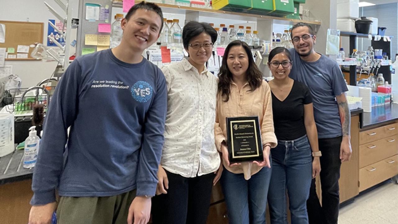 Molecular geneticist-physicist Joanna Chiu, professor and chair of the UC Davis Department of Entomology and Nematology, won the Distinction in Mentoring Award from the Pacific Branch, Entomological Society of America and shared the good news with her lab. From left are Yao Cai and Nitrol Liu, postdoctoral scholars, Professor Chiu, and Christine Tabuloc and Sergio Hidalgo, postdoctoral scholars. All have a doctorate in entomology from UC Davis. Cai, Liu and Tabuloc are all former entomology graduate stu
