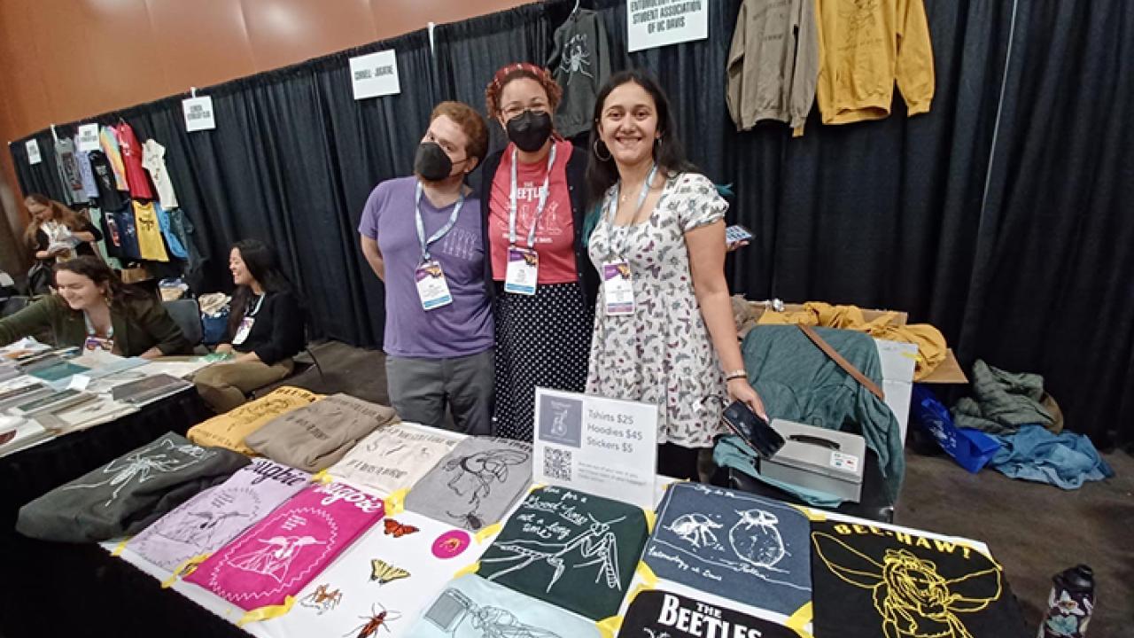The UC Davis Graduate Student Association (EGSA) staffed a booth at the recent Entomological Society of America meeting in Phoenix. From left are members Ziv Lieberman, Iris Quayle and CC Edwards. (Photo courtesy of Lexie Martin, EGSA president)