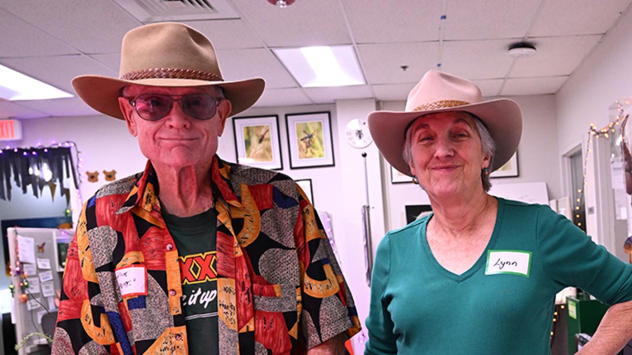 Entomologists Dick Meyer of Bakersfield and Lynn Kimsey of UC Davis wore their Australian hats at the Bohart Museum Society's Pre-Halloween Party. Both studied with major professor Richard Bohart. (Photo by Kathy Keatley Garvey)