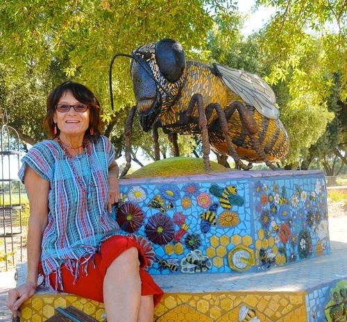 Donna Billick of Davis sculpted the six-foot-long worker bee, "Miss Bee Haven," that anchors the garden. (Photo by Kathy Keatley Garvey)