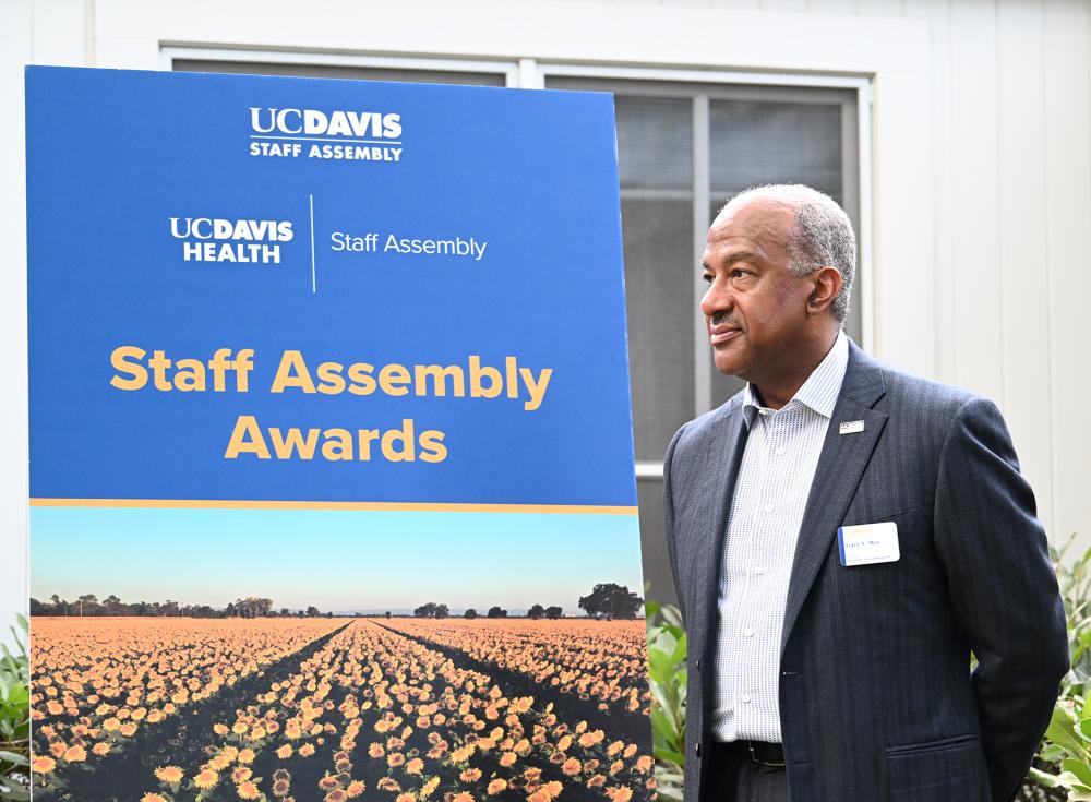 UC Davis Chancellor Gary May waits for the presentation to begin. (Photo by Kathy Keatley Garvey)
