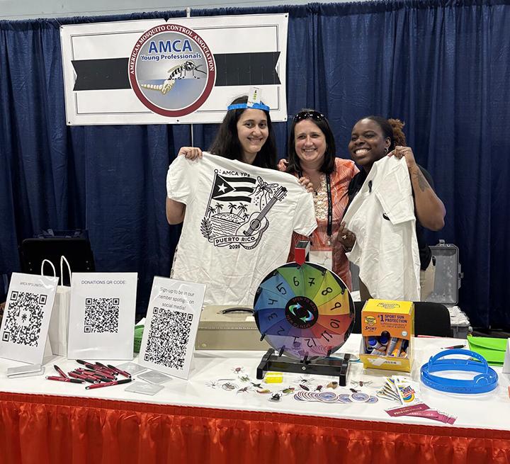 CC Edwards (left) with Dr. Broox Booze who works at Vector Disease Control International and helps organize the Young Professional (YP) travel awards, and Constance Darrisaw, a YP and a field biologist at Lee County Mosquito Control District, Florida.
