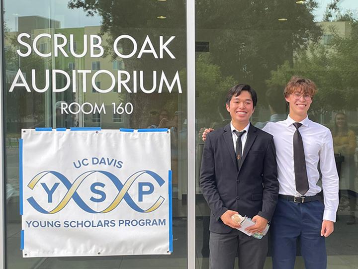 High school seniors Anderson Van Dang (left) and Mason Walline were mentored in the Shahid Siddique lab as part of the UC Davis Young Scholars Program.