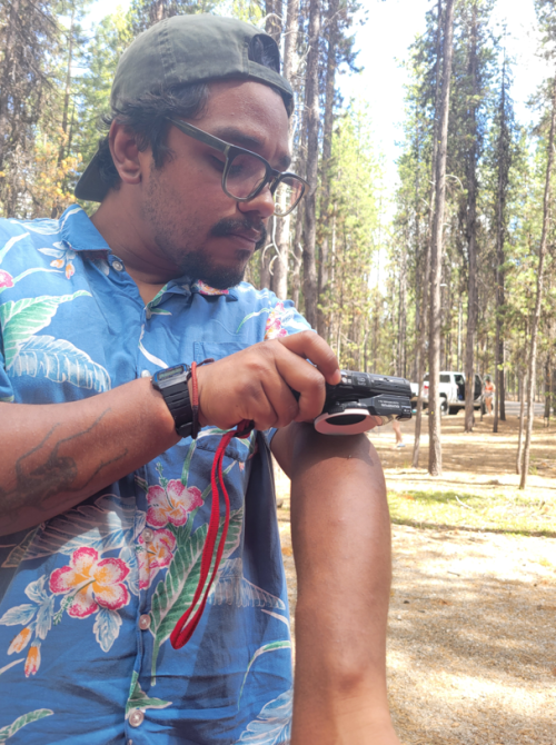 mosq photography: I like to take photos of mosquitoes. This is a photo of me taking a photo of Aedes communis. The resulting photo is the one named "Aedes communis"