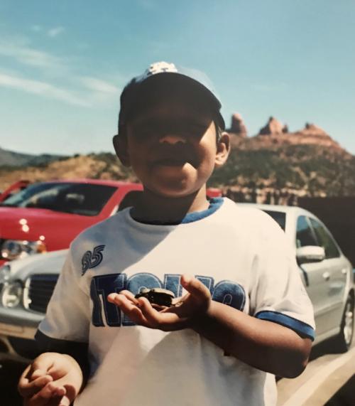beetle throwback: A photo of me as a kid in Sedona, Arizona holding a female Dynastes grantii