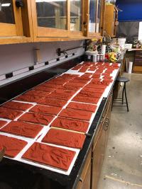 tiles glazed ready for kiln