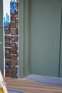 First Tiles Laid On