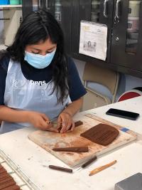 Alondra Bravo making trim pieces