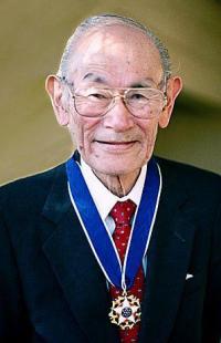 Fred Korematsu with U.S. Presidential Medal of Freedom in 1998