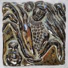 This tile shows the face and flowing hair of the corn maiden with a corn plant in the background.