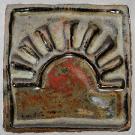 This tile shows an iconic sun symbol.