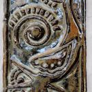 This tile shows a mythological bird called the Ku Bird.