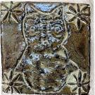This tile shows an iconic small owl.