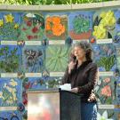 Entomologist-artist Diane Ullman, co-founder and co-director of the UC Davis Art-Science Fusion Program, speaks at the dedication of "Nature's Gallery" in the UC Davis Arboretum and Public Garden in 2012. (Photo by Kathy Keatley Garvey)