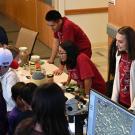 The nematode display, headed by associate professor Shahid Sidique, was a popular attraction at the 2024 UC Davis Biodiversity Museum Day. From left are doctoral student Nick Latina and doctoral candidates Pallavi Shakya and Alison Blundell. (Photo by Kathy Keatley Garvey)