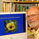 Robbin Thorp and the image he took of Franklin's bumble bee near Mt. Ashland. (Archived image taken Oct. 15, 2007 by Kathy Keatley Garvey) 