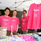Three entomology students selling Bugbie T-shirts at Briggs Hall.